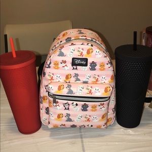 Loungefly Disney cats and dogs book bag